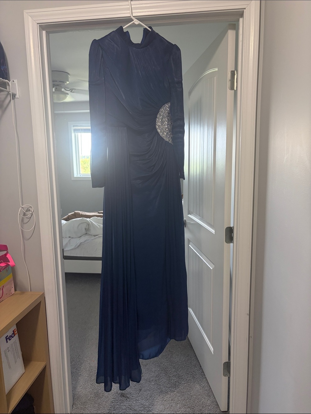 Elegant Navy Blue Long Sleeve Evening Gown with Embellished Waist